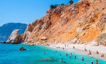 Boat departing from Adrasan Marina for the Suluada Island tour