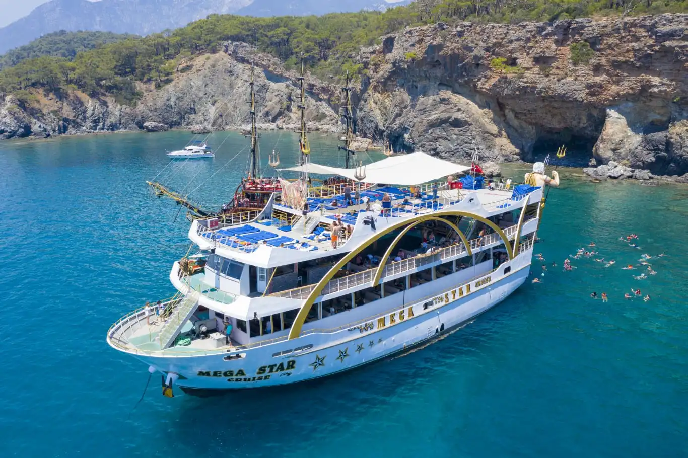 Antalya cruise boat upper deck with sunbeds and panoramic sea views