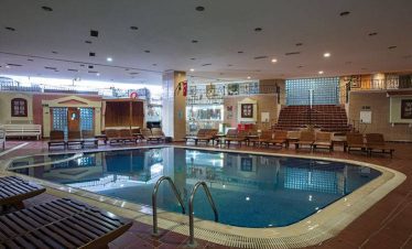 Soothing oil massage therapy session at a Turkish bath in Antalya