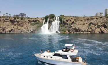 lara waterfall with yacht