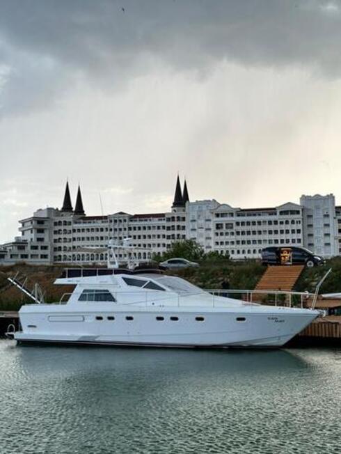 Exterior view of a luxury yacht in Antalya's Kundu region, with stunning sea views