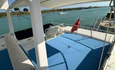 Sunbathing area on a luxury yacht in Antalya, with panoramic Mediterranean views