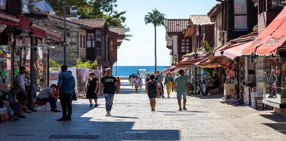 Charming streets of Side's old town with ancient ruins and local shops