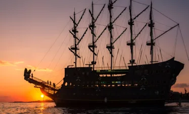 Tourists taking photos at pirate cave during Antalya pirate boat tour