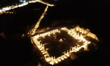 Tour guide explaining history at Perge