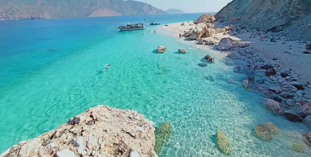 Suluada Island boat tour with crystal clear turquoise water in Antalya, known as the Turkish Maldives.