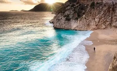 Best beaches in Antalya — turquoise water and pebble cove on the Antalya coast Turkey