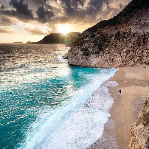 Best beaches in Antalya — turquoise water and pebble cove on the Antalya coast Turkey